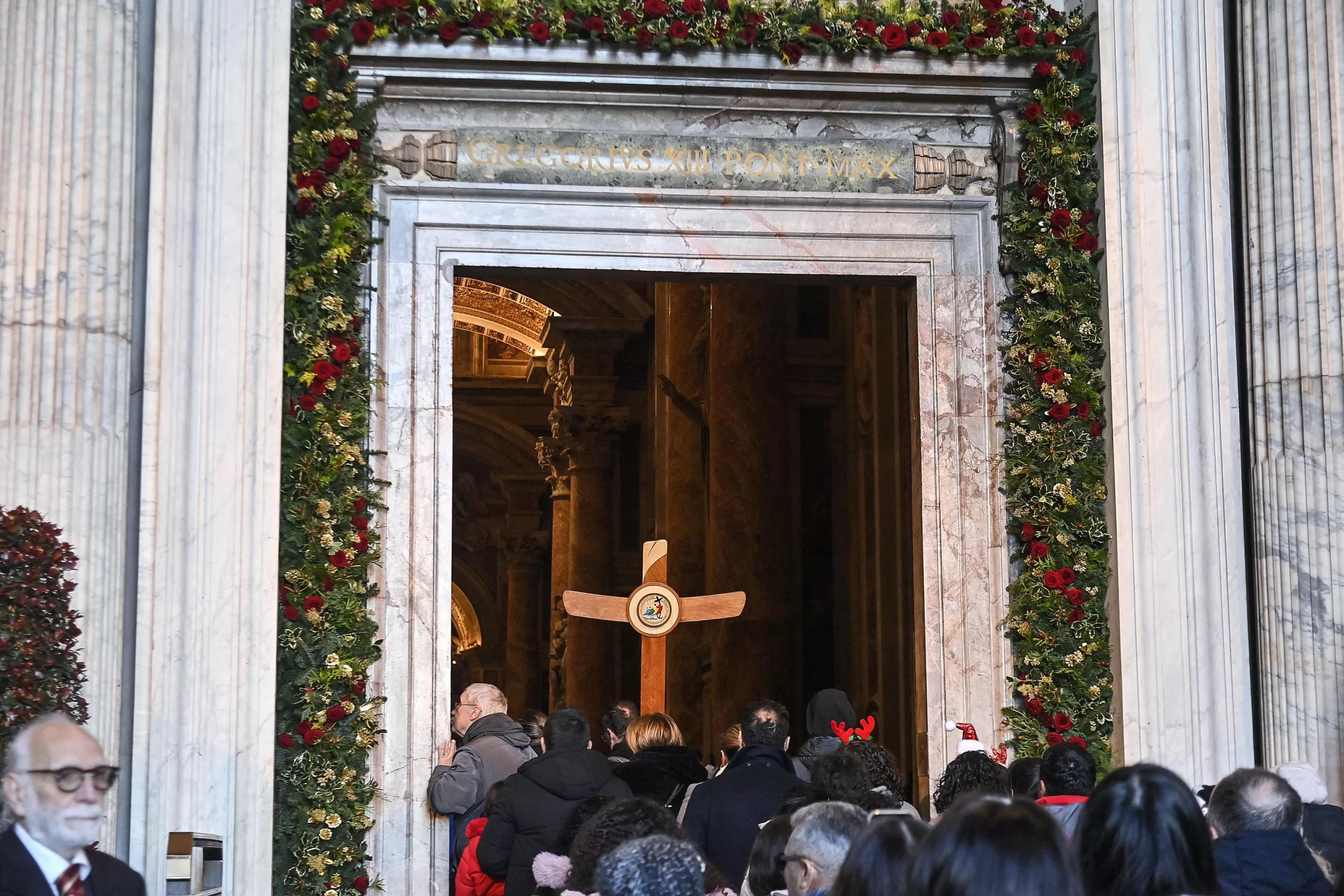 Kaip teisingai eiti pro Šventąsias duris